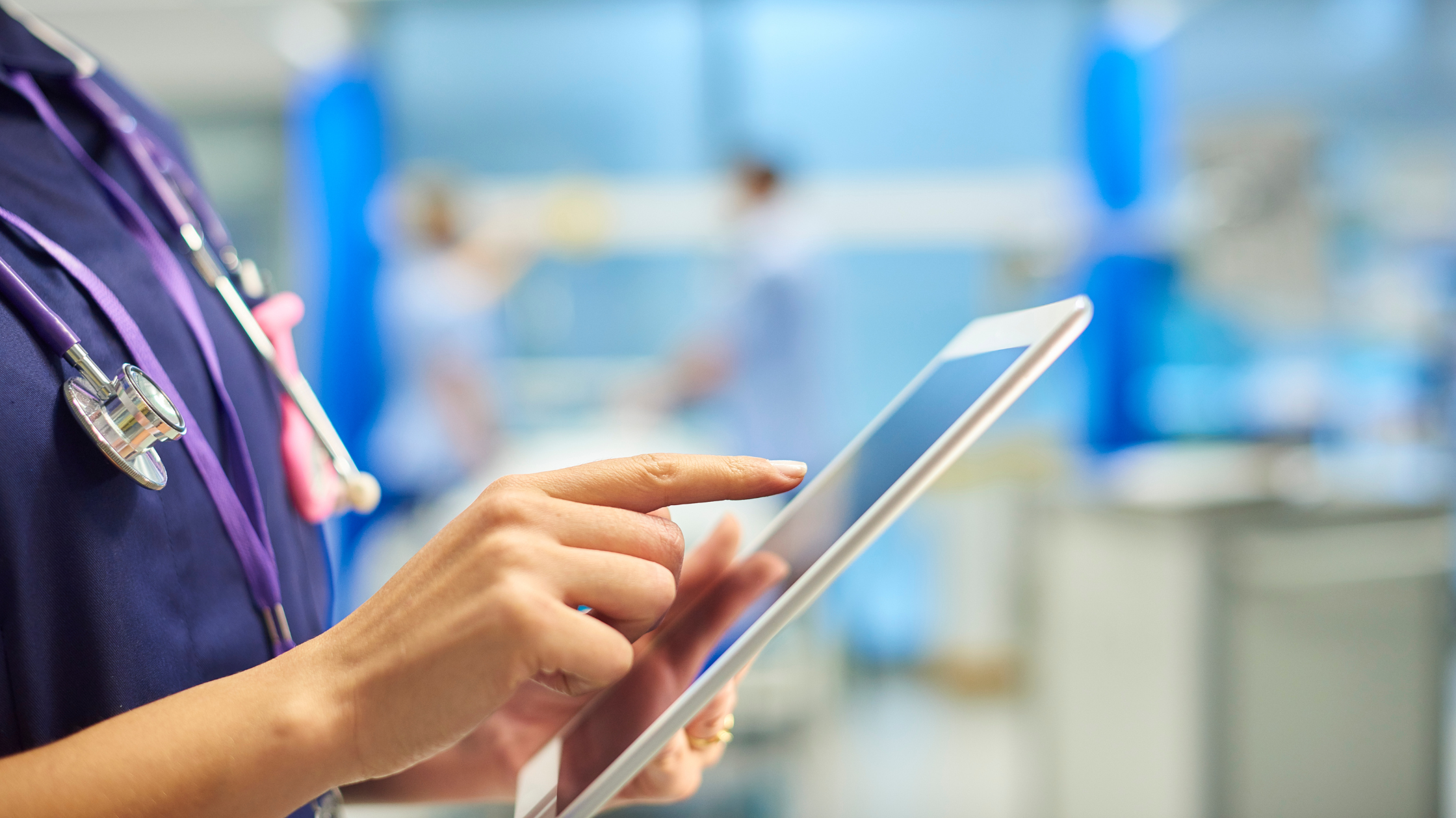 Image of nurse with tablet