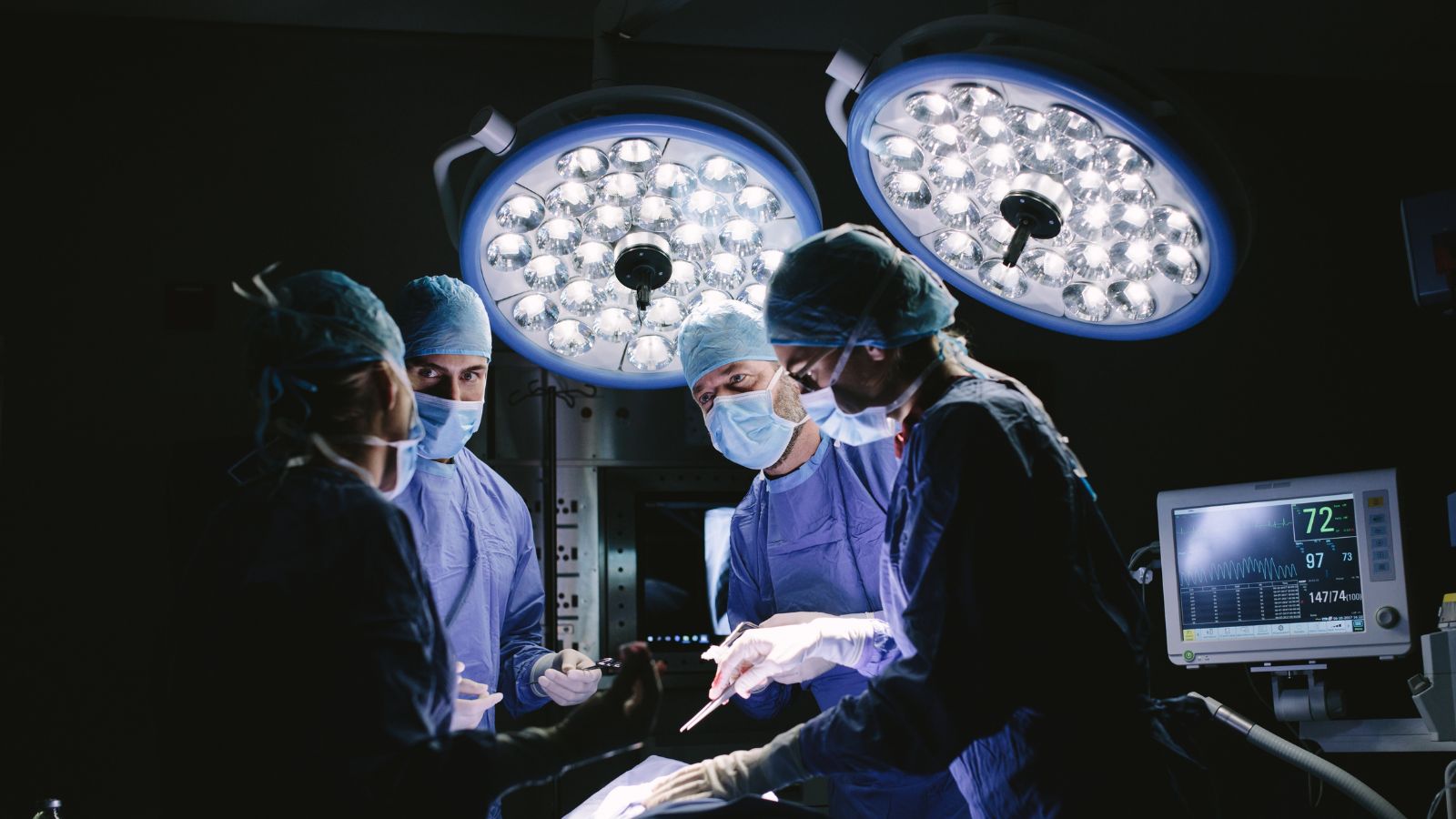 Photo of surgeons in operating room