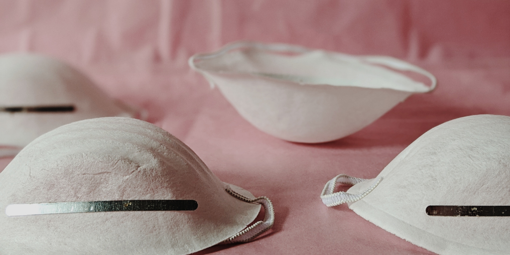 Face masks on pink background