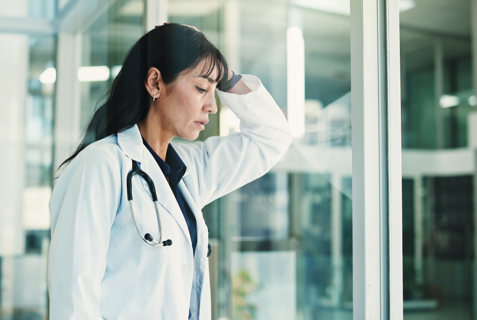 Image of doctor appearing stressed