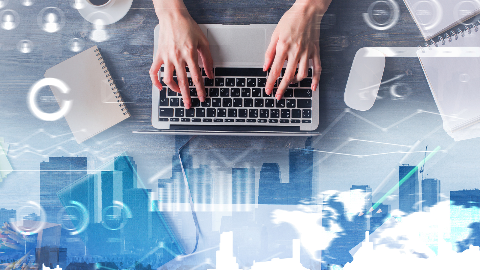 Photo of hands typing on laptop