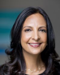 a woman smiling for a portrait