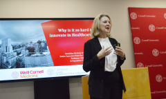 Photo of Dr. McGinty speaking at networking event