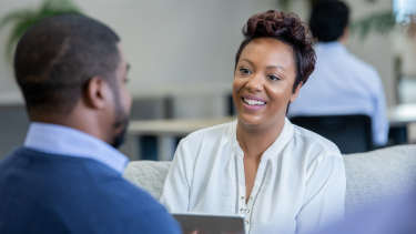 Photo of behavioral health worker with patient