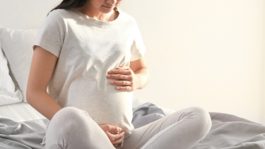 Image of pregnant woman sitting 